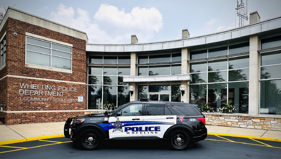 PoliceCarInFrontOfPoliceStation